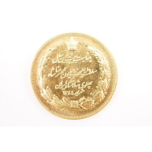 288 - A 1970's Iranian gold medal celebrating the 2500 years of empire, depicting Mohammad Reza Shah Pahla... 