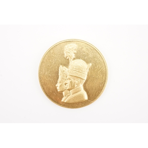 289 - A 1967 Iranian Mohammad Reza Pahlavi Coronation gold medal. Weight 34.2g.