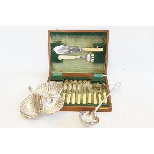 81 - A plated canteen of cutlery, along with a large plated ladle and a Mappin & Webb shell design dish.