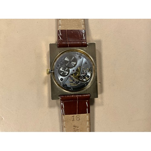 262 - A 9ct Gold Oval Faced Tank Style Gentleman's Longines Wristwatch with a Brown Leather Strap & a Gold... 