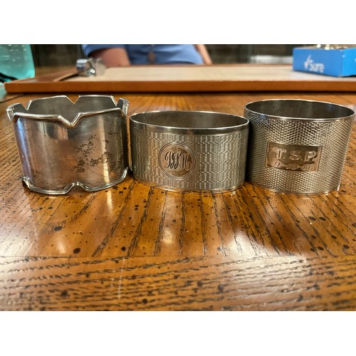12 - A Silver Engine Turned design Ashtray along with Three Silver Napkin Rings & a Silver Weighted Stem ... 