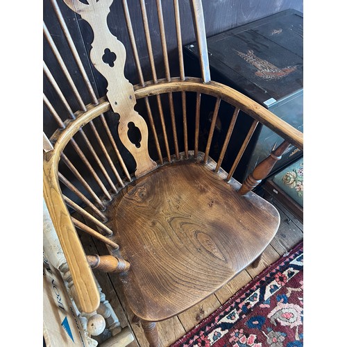 581 - A Victorian Wheel & Splat Back Windsor Chair in Elm & Beech resting on Turned Legs & Cross Stretcher... 