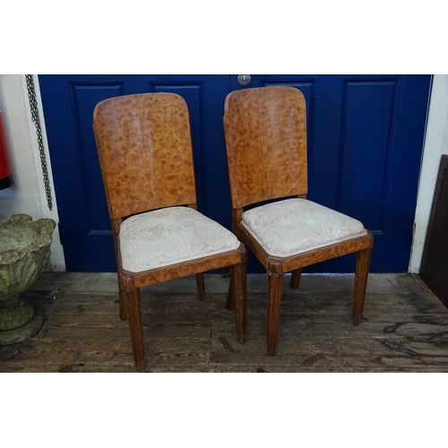 508 - A Pair of 1930s Biedermeier style Burr Walnut veneered Front & Back Dining Chairs resting on square ... 