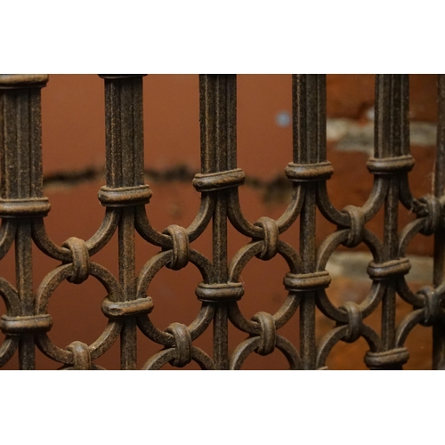 518 - A Pair of Moroccan Three Folding Hardwood & Wrought Iron Screens with panelled bases. Measuring: 185... 