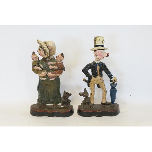 389 - A Pair of Cast Iron Half Dogs designed as Mr & Mrs Alexander Soper decorated in a variety of colours... 