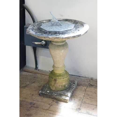 584 - A Reconstituted Stone Pedestal of Circular Form on a Square Base fitted with an Aluminium Sun Dial. ... 