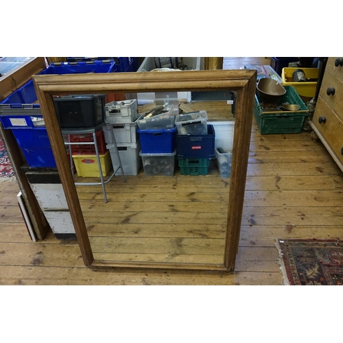 554 - A Pine Framed Mirror. Measuring: 86cms x 105cms.