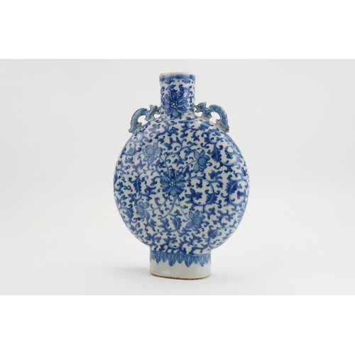 316 - A Chinese blue and white pilgrims flask, with floral decoration and twin handles.