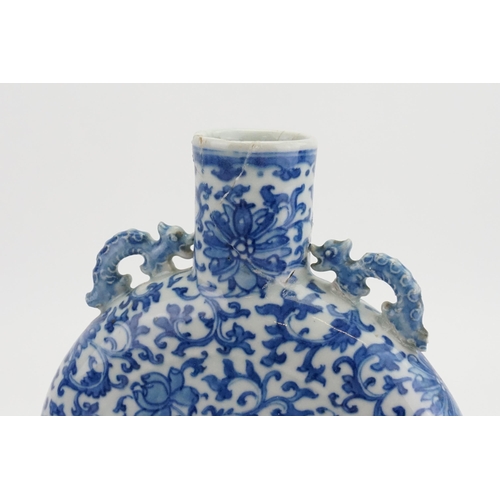 316 - A Chinese blue and white pilgrims flask, with floral decoration and twin handles.