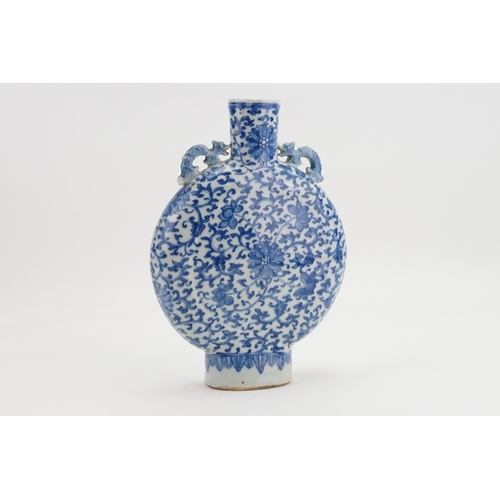 316 - A Chinese blue and white pilgrims flask, with floral decoration and twin handles.