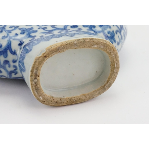 316 - A Chinese blue and white pilgrims flask, with floral decoration and twin handles.