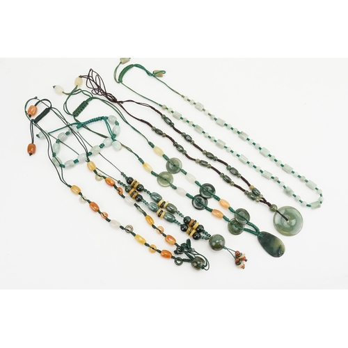 151 - A collection of bead necklaces to include possible Jade & Amber.