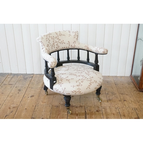 528 - A Late 19th Century Aesthetic Button Back Low Seated ebonised Wood Drawing Room Chair resting on Ori... 