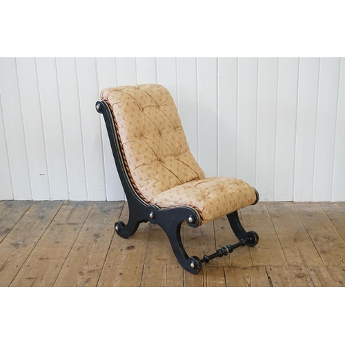 531 - A Victorian Brass mounted & Beaded ebonised low down Nursing Chair with button back upholstered in C... 