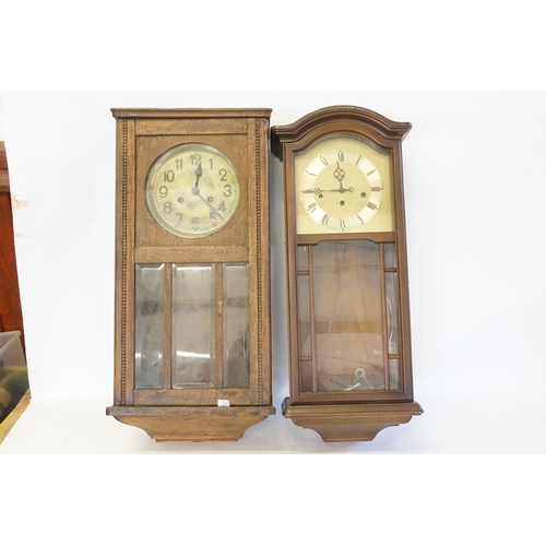 261 - Two Wood Cased Wall Clocks.