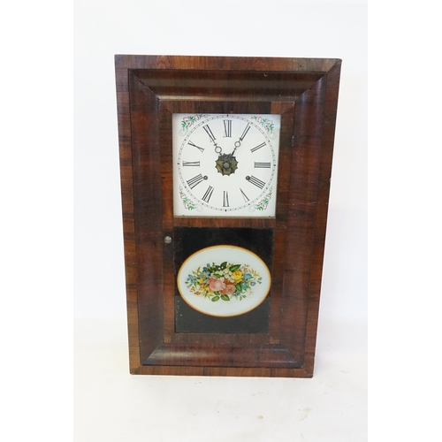 271 - A Walnut Cased American Wall Clock with Painted Glass Door. Measuring: 64cms x 40cms.