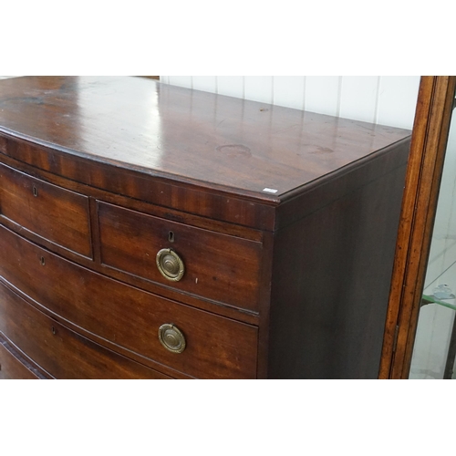 519 - A Georgian Mahogany Bow Fronted Chest of Three Short & Three Long Drawers resting on Bracket & Brass... 