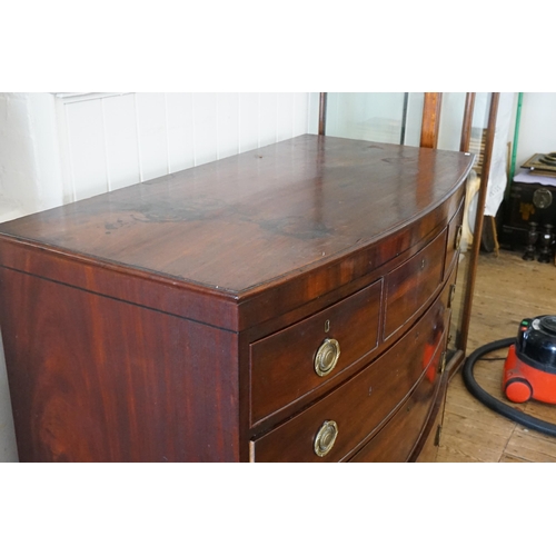 519 - A Georgian Mahogany Bow Fronted Chest of Three Short & Three Long Drawers resting on Bracket & Brass... 