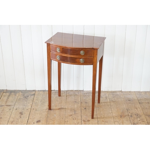 525 - An Edwardian Bow Fronted Cuban Mahogany Veneered Side Table resting on Square Tapering Legs. Measuri... 