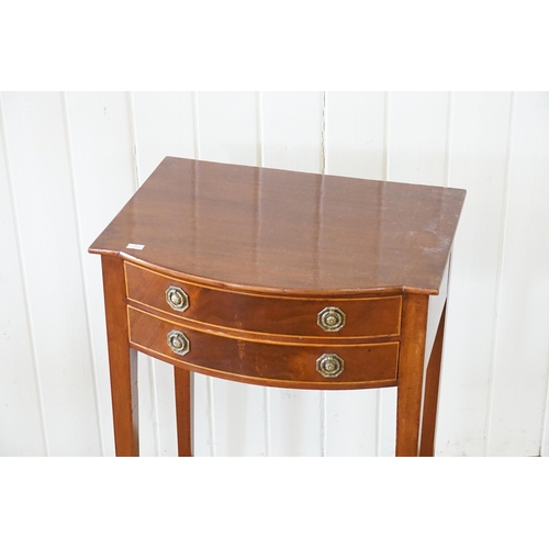 525 - An Edwardian Bow Fronted Cuban Mahogany Veneered Side Table resting on Square Tapering Legs. Measuri... 