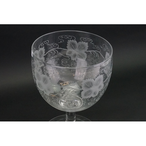 723 - A Large Grape & Vine decorated Punch Bowl resting on a Pedestal Base. Measuring: 30cms high x 22cms ... 