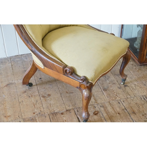 478 - A Victorian Mahogany Framed Button Back Easy Chair resting on Shaped Front Legs with Brass Castors &... 