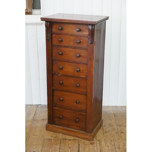 482 - A Victorian Walnut Wellington Chest with Locking Pilaster with a bank of seven Graduated drawers. Me... 