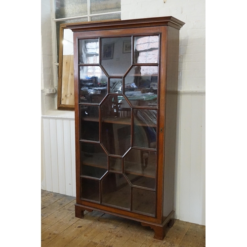 485 - A Chippendale design Astragal Glazed Display Cabinet with fitted shelves & resting on Bracket Feet. ... 