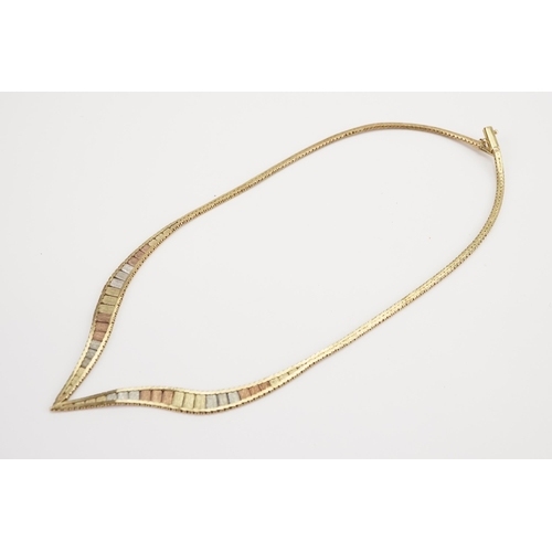 153 - A 9ct Tri-Gold Necklace. Weight 16.6g.