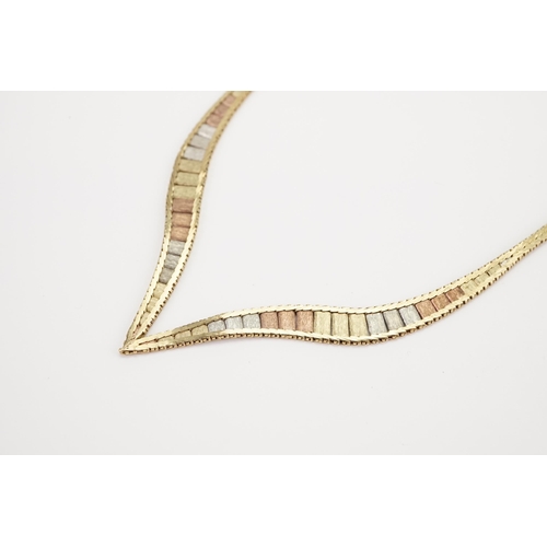 153 - A 9ct Tri-Gold Necklace. Weight 16.6g.