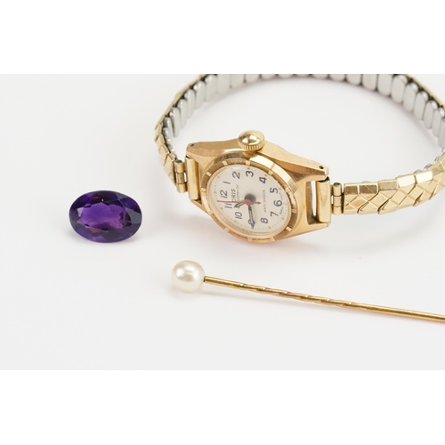 187 - An Amethyst Gem Stone along with a Pearl Stick pin and a Gold coloured Oris watch.