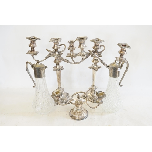 117 - A Pair of Silver Plated Candelabra's, one other & Two Claret Jugs.