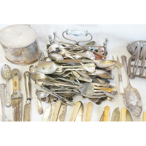 118 - A quantity of Silver Plated Cutlery, a Tea Caddy, a Cocktail Shaker, Pastry Tongs, etc.