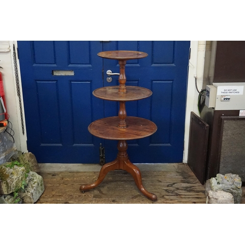 496 - A Victorian Mahogany Three Tiered Dumb Waiter resting on a Tripod Base. Measuring: 123cms high.