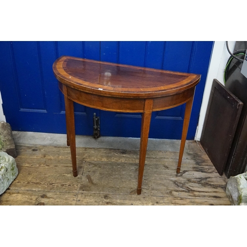 498 - A Regency design Chestnut & Laburnum Fold-Over Top Card Table resting on square tapering spade feet.... 