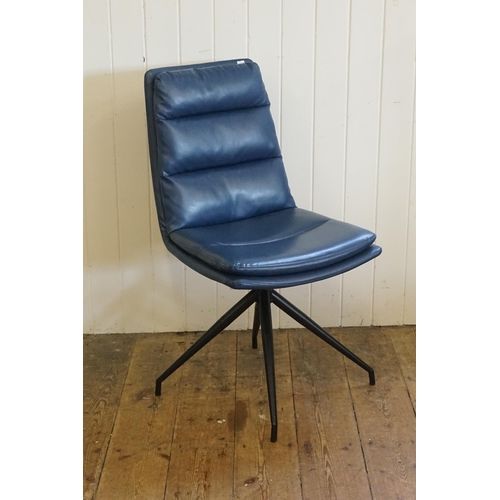 500 - A Set of Six Modern Over Stuffed Swivel Dark Blue Dining Chairs resting on a 1950s design Legs.