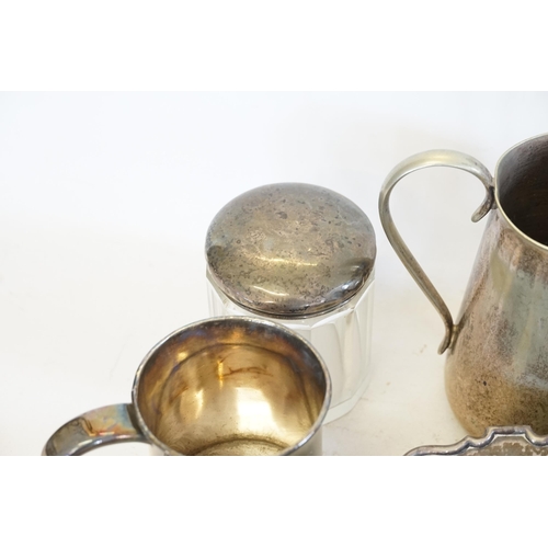 121 - A Silver Topped Scent Bottle, Silver Plated Toast Racks, Trivet, Muffin Dish, etc.