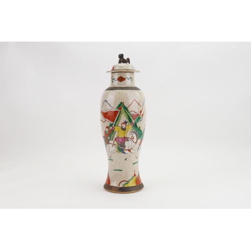 310 - A Chinese Crackle Glazed Vase decorated with Mogul Warriors. Measuring: 33cms.