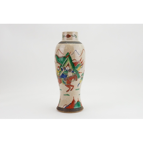 310 - A Chinese Crackle Glazed Vase decorated with Mogul Warriors. Measuring: 33cms.