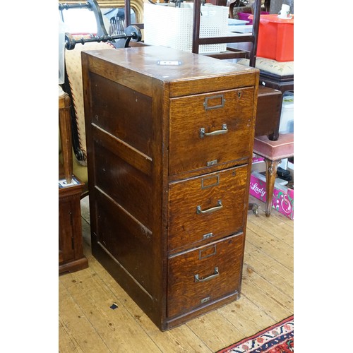 472 - A 1920s Oak Three Drawers Filing Cabinet fitted with Brass Handles. Measuring: 41cms across x 68cms ... 