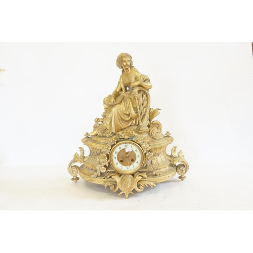 280 - A Spelter Drawing Room Clock depicting a Classical Young Lady with a Harp resting on a floral Festoo... 