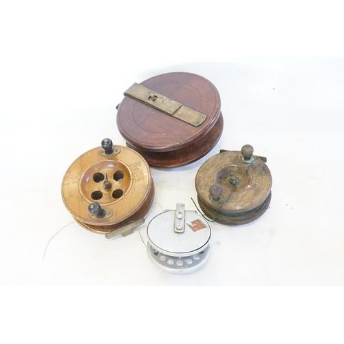 758 - Three Antique Wood Cased Nottingham Fishing Reels & one other Centre Pin.