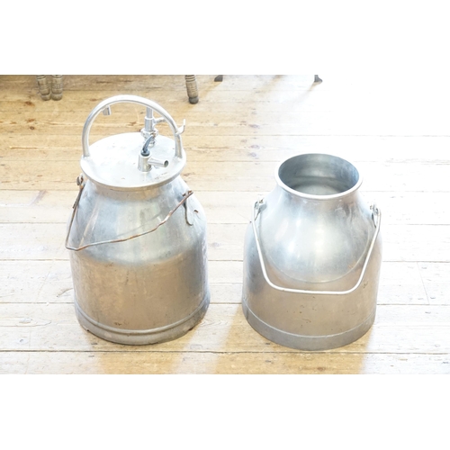 607 - Two Aluminium Steaming Urns. Measuring: 50cms high.