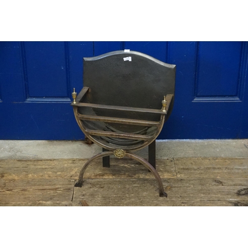 602 - An Adams design X Framed Fire Basket with Brass embellishments. Measuring: 38cms across x 17cms deep... 