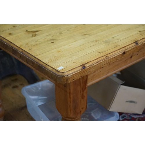 469 - A Victorian design Scrubbed Top Pine Table resting on turned legs. Measuring: 180cms long x 90cms ac... 