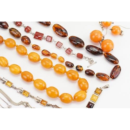 195 - A collection of amber coloured jewellery to include bracelets, necklaces, beads, earrings, etc.