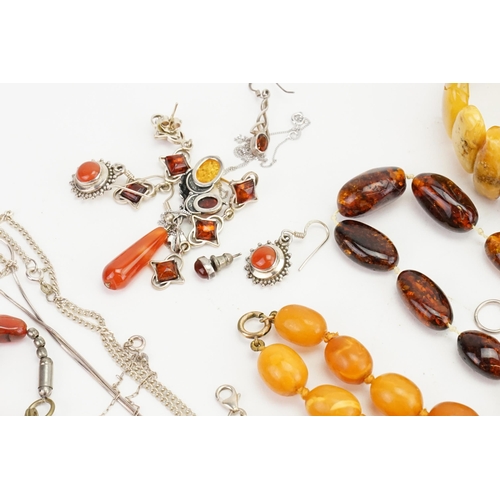 195 - A collection of amber coloured jewellery to include bracelets, necklaces, beads, earrings, etc.