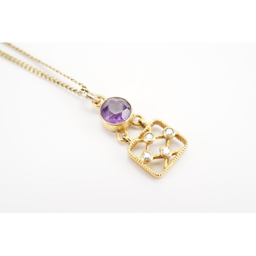 144 - A Diamond & Amethyst set Pendant hung on a 12k marked chain & set with four small chip Diamonds.