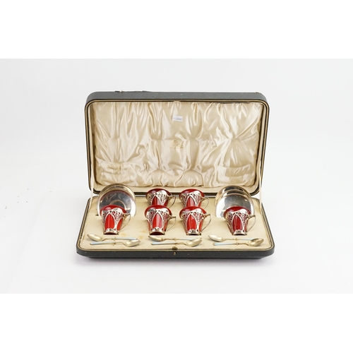 61 - A Cased set of Art Nouveau Six Silver mounted Royal Doulton flambe coffee cups and saucers, dated 19... 