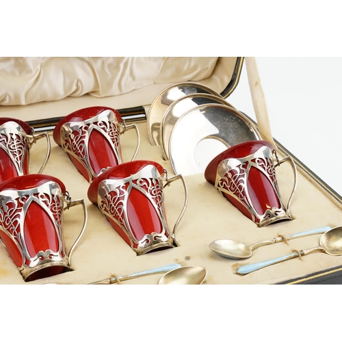 61 - A Cased set of Art Nouveau Six Silver mounted Royal Doulton flambe coffee cups and saucers, dated 19... 